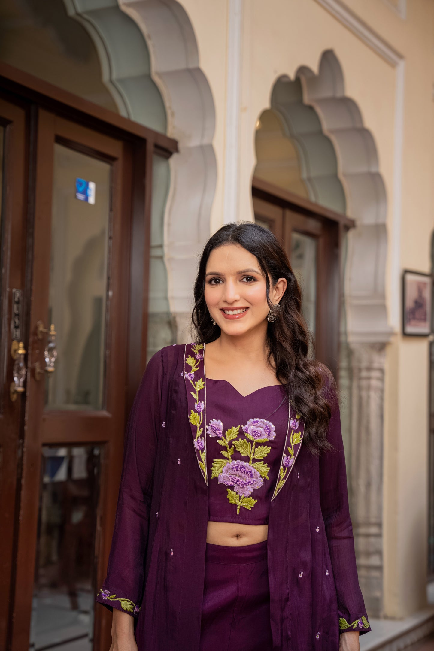 woman in a purple coord set featuring floral prints, presenting a chic version of kurta pant set for women.